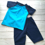 Load image into Gallery viewer, boys dance gymnastics shirt and short set in turquoise with accented navy with short sleeves 
