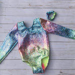 Load image into Gallery viewer, Girls long sleeve leotard for gymnastics or dance in a Pastel tie dye with shiny silver overlay. Matching scrunchie included.
