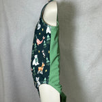 Load image into Gallery viewer, Side view of leotard, front has cute holiday animals and solid sage green back
