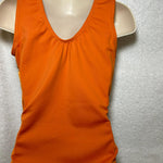 Load image into Gallery viewer, back view of solid burnt orange tank leotard
