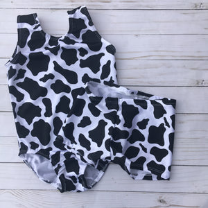 Black and white Cow print toddler girls gymnastics dance tank leotard with matching scrunchie and optional matching shorts