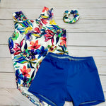 Load image into Gallery viewer, girls tank leotard with colorful watercolor floral print on white background with matching scrunchie and coordinating blue shorts

