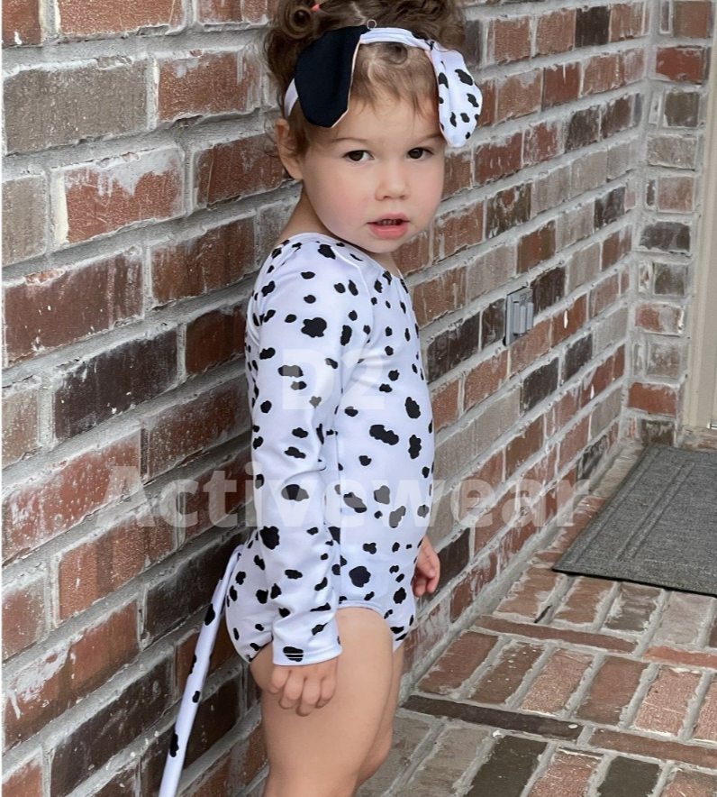 Dalmatian costume for baby, toddler, kids. Long Sleeve leotard with attached tail in white with black spots. Dalmatian ear headband to match