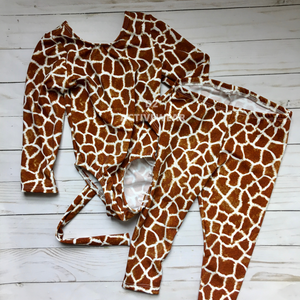 kids giraffe costume.  Long sleeve leotard with attached tail and leggings in red brown and white giraffe print