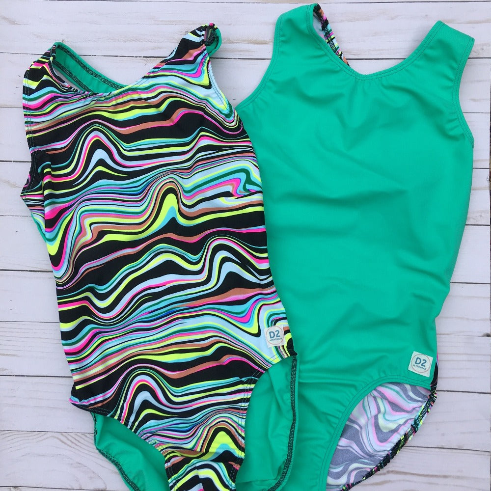 Wriggle striped leotard with Seafoam green back with another leotard the reverse (seafoam front and wiggle strip back)